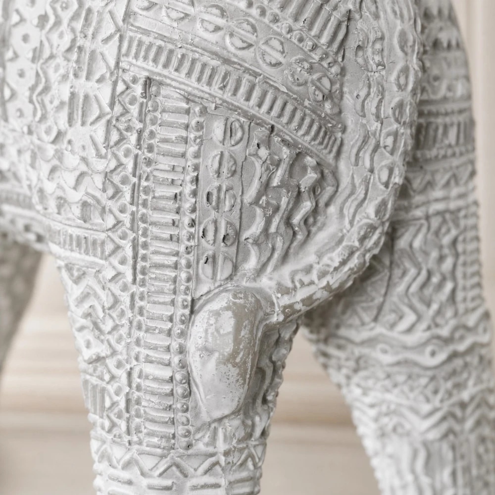 Close detail of the handmade resin lion ornament finish