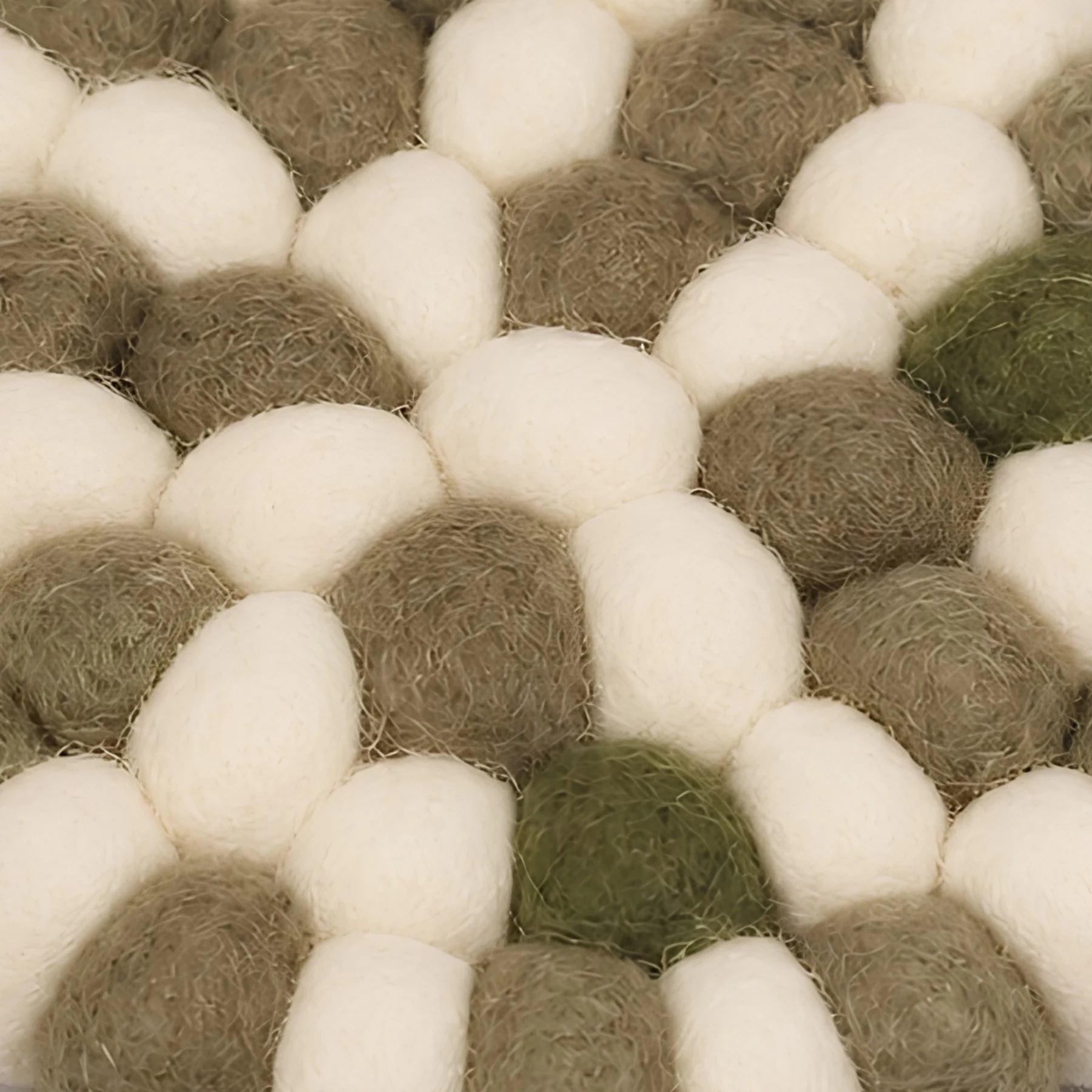 Close view of soft felt ball texture