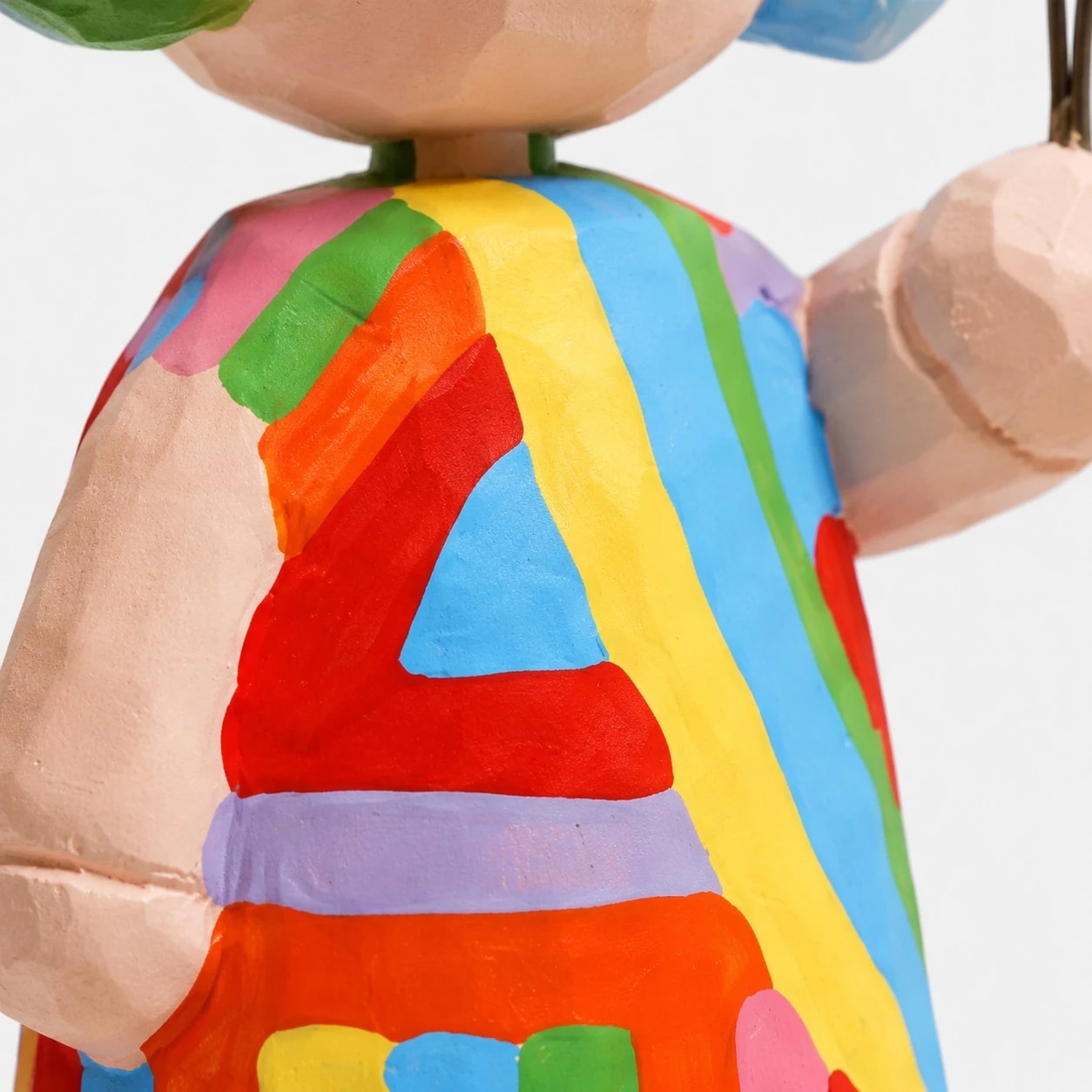 Rainbow dress carved detail
