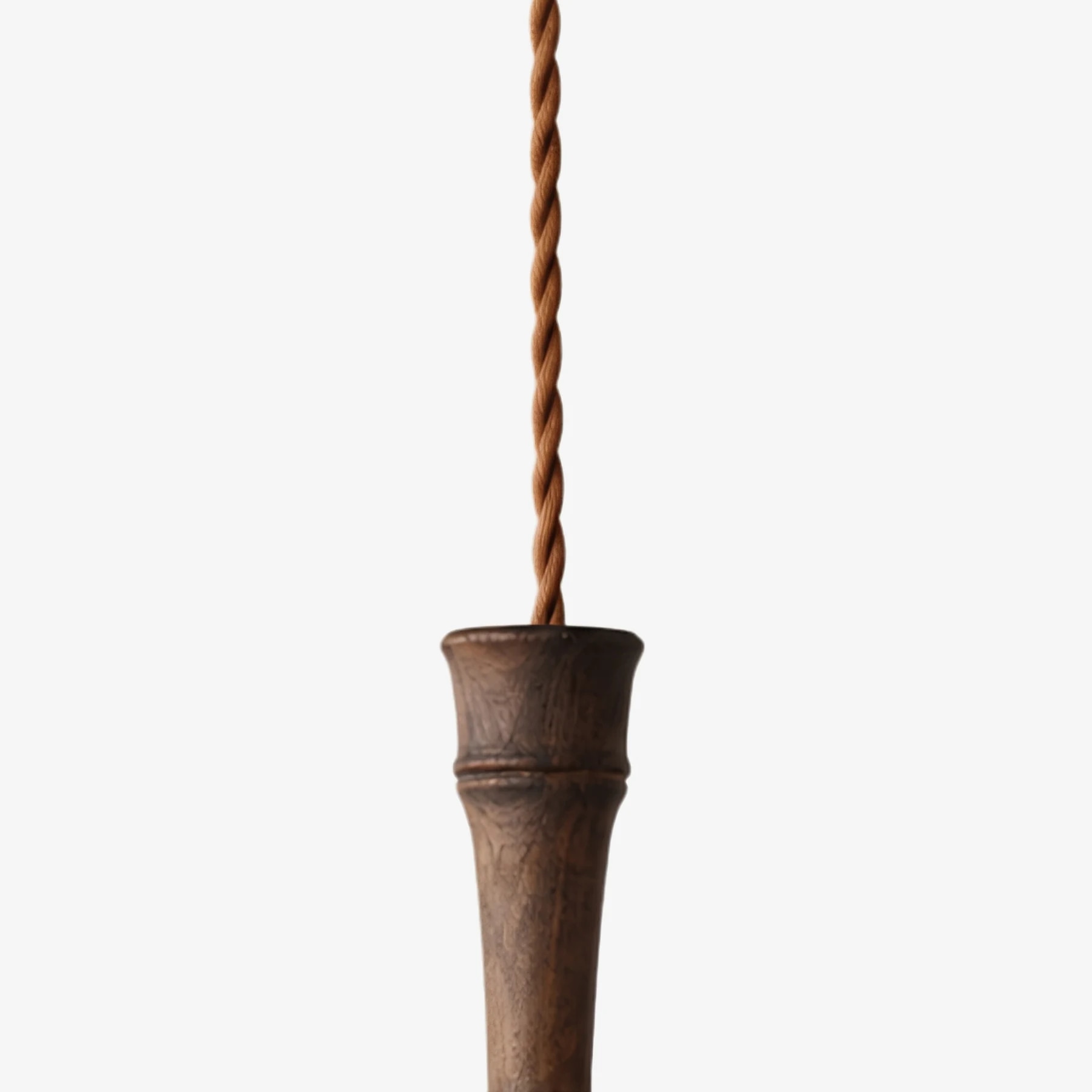 Tapered wood holder detail on the pendant lamp