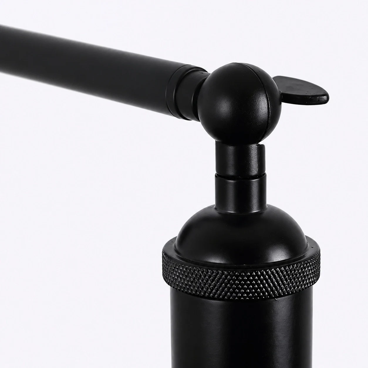 Adjustable black metal joint detail