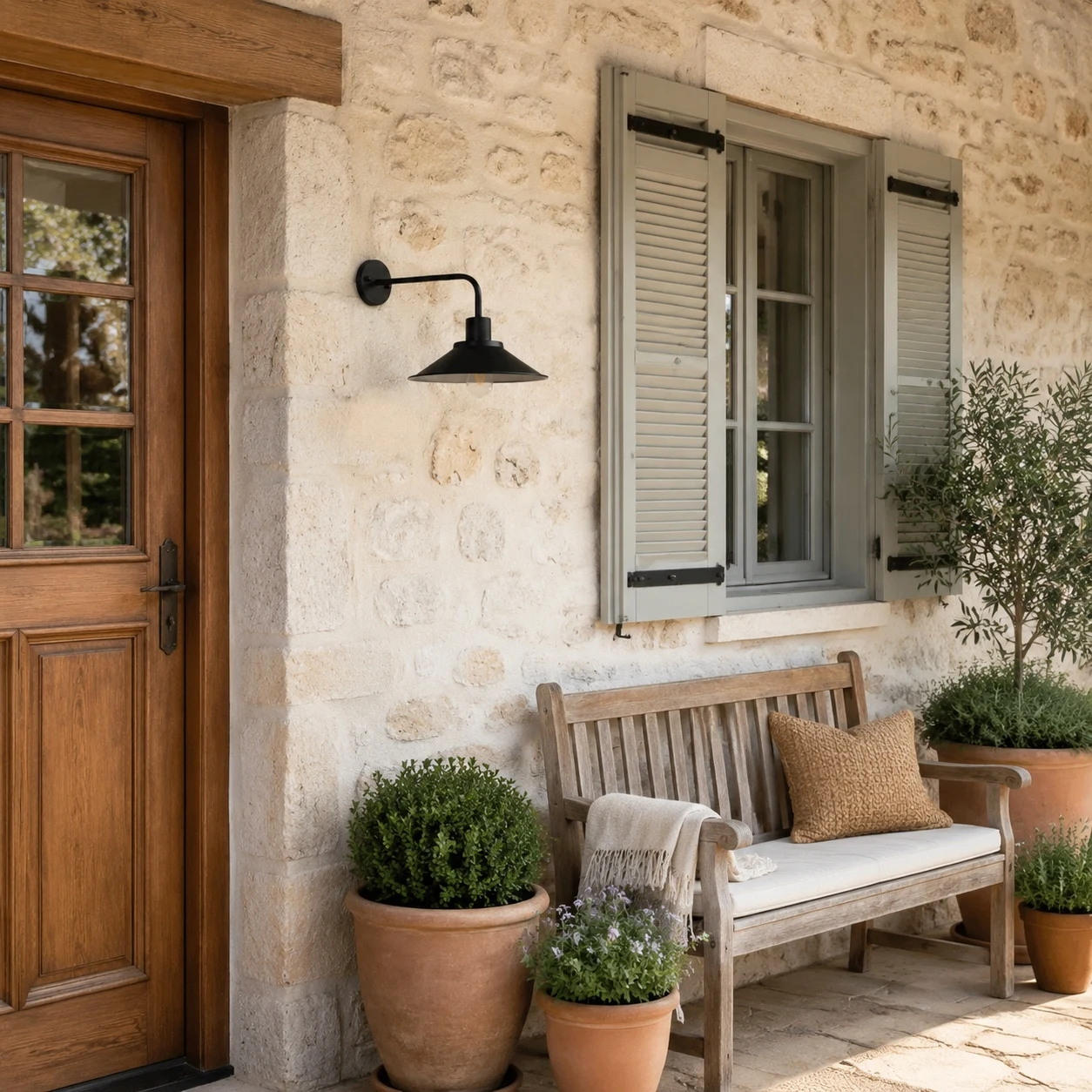 Outdoor wall lamp by a seating area