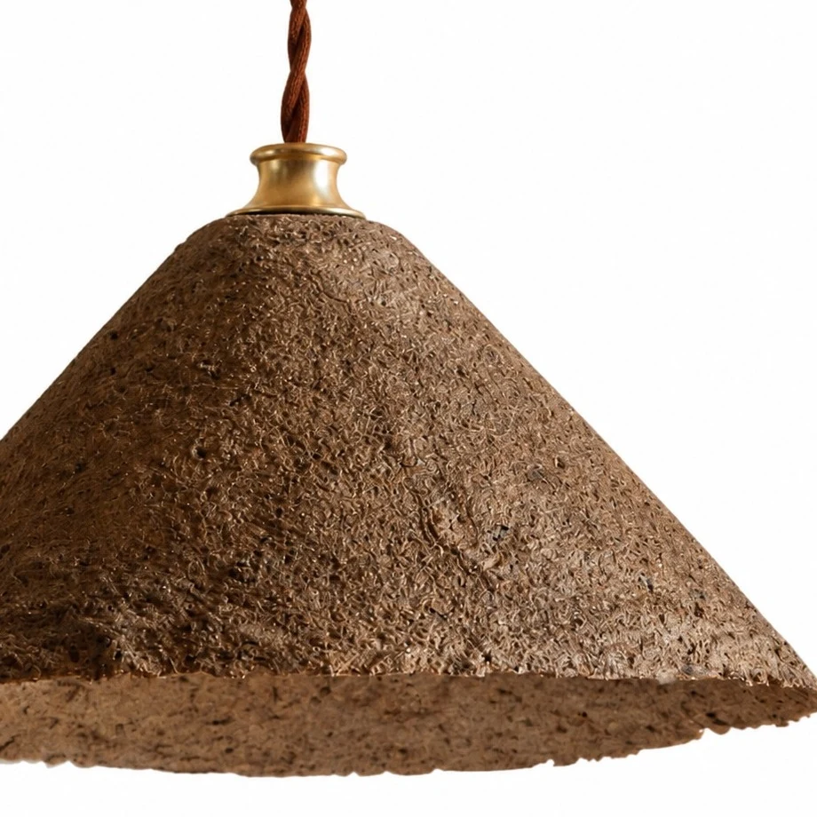 Close view of textured conical pendant shade